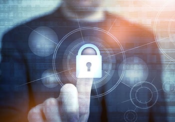 A man touching a digital lock, representing cybersecurity in Portland, OR & San Jose, CA.