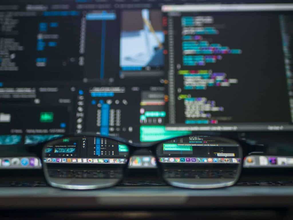 A pair of glasses on a laptop.