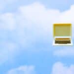 cloud-computing An old computer floating in the clouds.