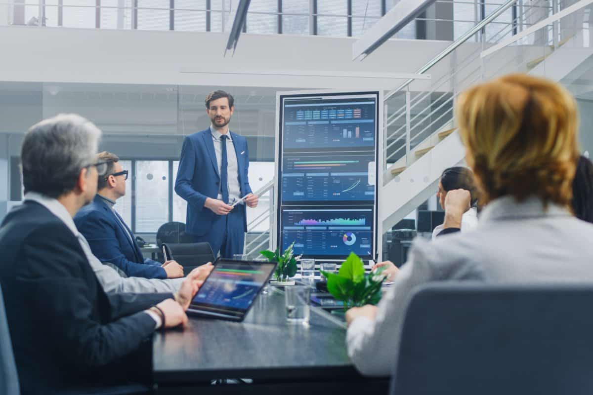 Two IT Specialists walking in a server room