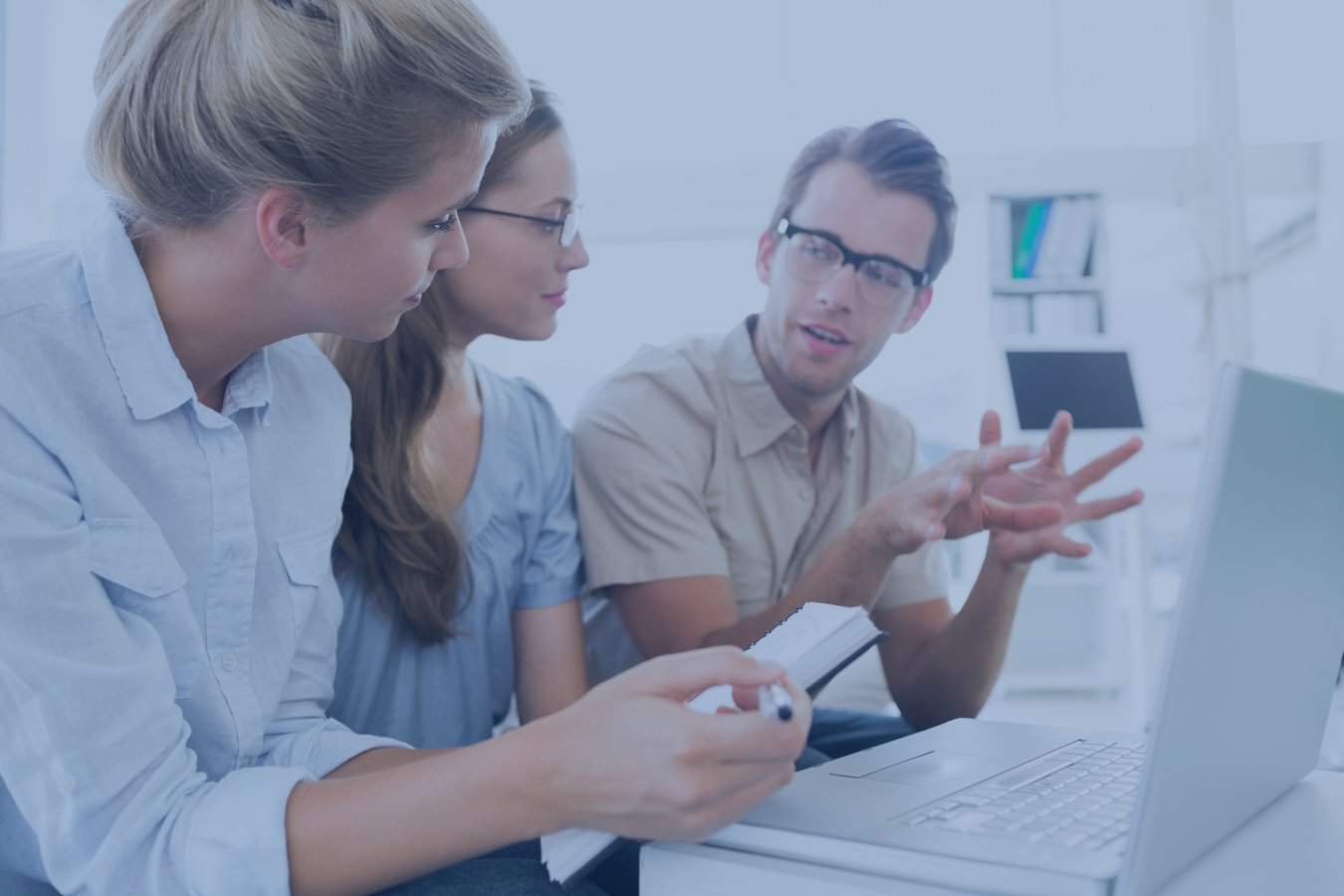 A group of people discussing cyber compliance and insurance.