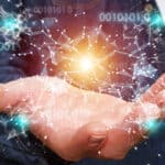 vCIO Concept A businessman is holding out his hand to reveal a 3D render of connected nodes and binary code.